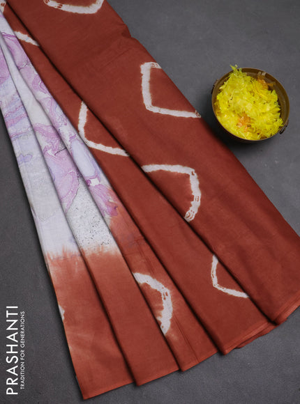 Batik cotton saree multi colour and rustic orange with allover prints and batik printed border