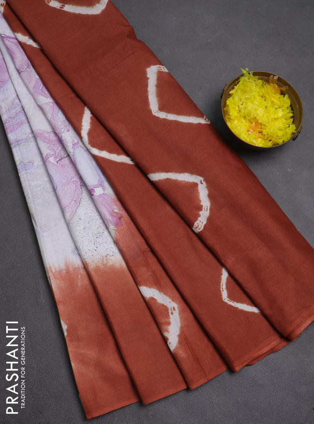 Batik cotton saree multi colour and rustic orange with allover prints and batik printed border