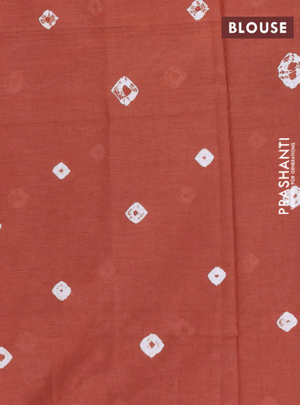 Batik cotton saree multi colour and rustic orange with allover prints and batik printed border