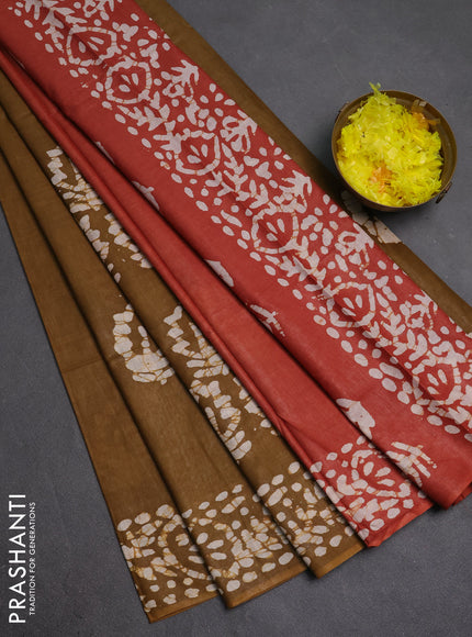 Batik cotton saree dark mustard and rust shade with batik butta prints and batik printed border