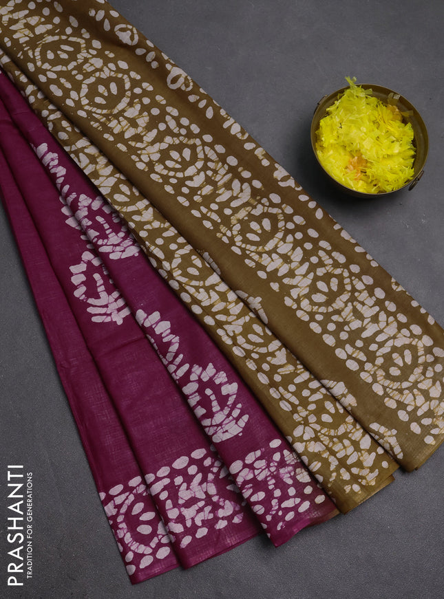 Batik cotton saree wine shade with batik butta prints and batik printed border