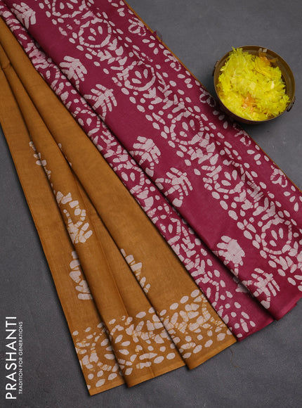Batik cotton saree mustard yellow and wine shade with batik butta prints and batik printed border