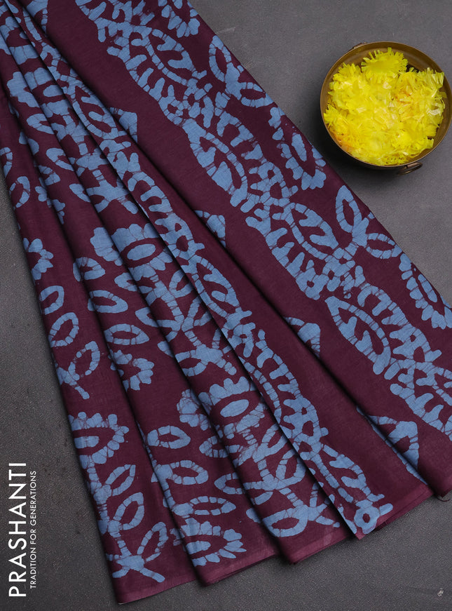 Batik cotton saree wine shade and blue with allover batik prints in borderless style