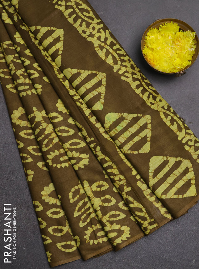 Batik cotton saree mehendi green and yellow with allover batik prints in borderless style