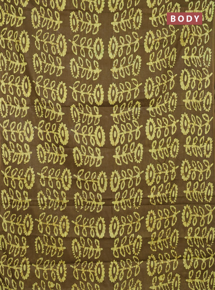 Batik cotton saree mehendi green and yellow with allover batik prints in borderless style