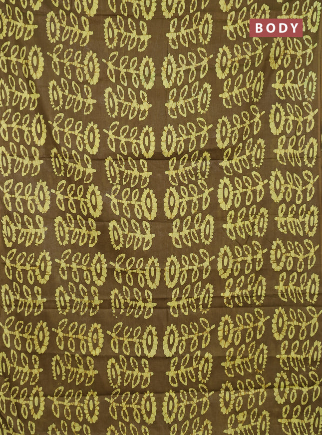Batik cotton saree mehendi green and yellow with allover batik prints in borderless style