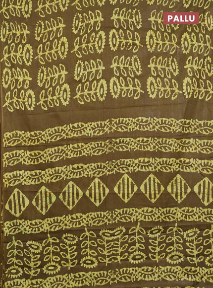 Batik cotton saree mehendi green and yellow with allover batik prints in borderless style