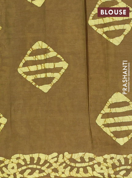 Batik cotton saree mehendi green and yellow with allover batik prints in borderless style