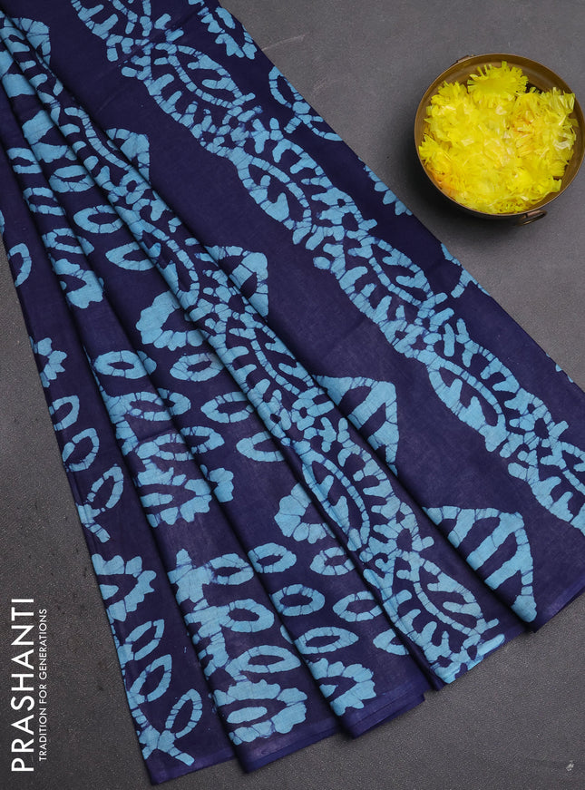 Batik cotton saree navy blue and teal blue with allover batik prints in borderless style