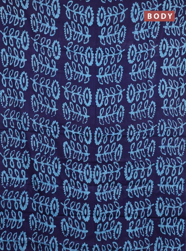 Batik cotton saree navy blue and teal blue with allover batik prints in borderless style
