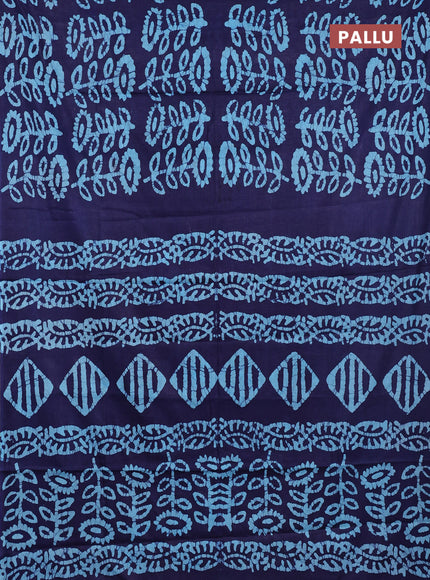 Batik cotton saree navy blue and teal blue with allover batik prints in borderless style