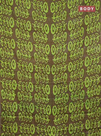 Batik cotton saree mehendi green and fluorescent green with allover batik prints in borderless style