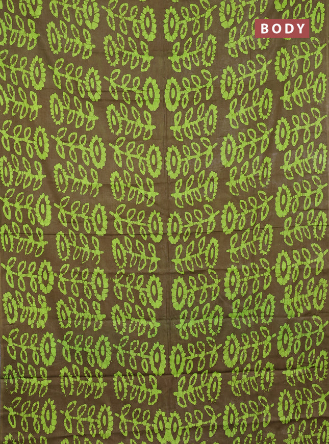 Batik cotton saree mehendi green and fluorescent green with allover batik prints in borderless style