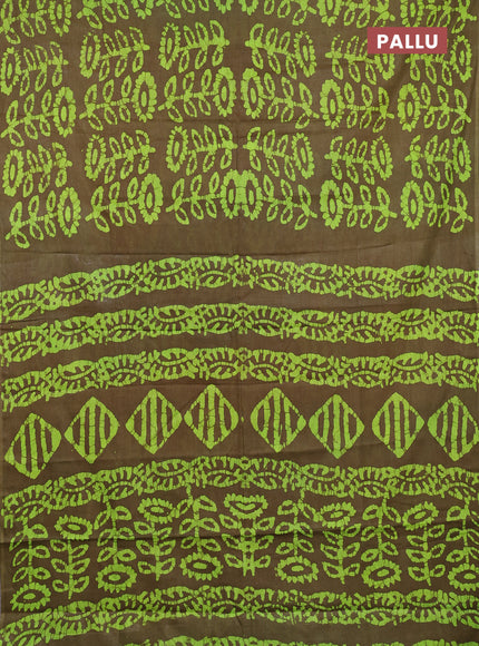 Batik cotton saree mehendi green and fluorescent green with allover batik prints in borderless style