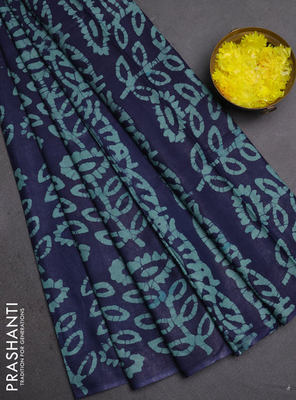 Batik cotton saree navy blue and teal green with allover batik prints in borderless style