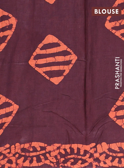 Batik cotton saree deep maroon and rust shade with allover batik prints in borderless style