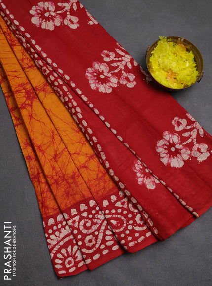 Batik cotton saree sunset orange and red with allover prints and batik printed border