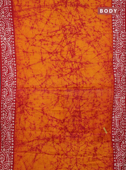 Batik cotton saree sunset orange and red with allover prints and batik printed border