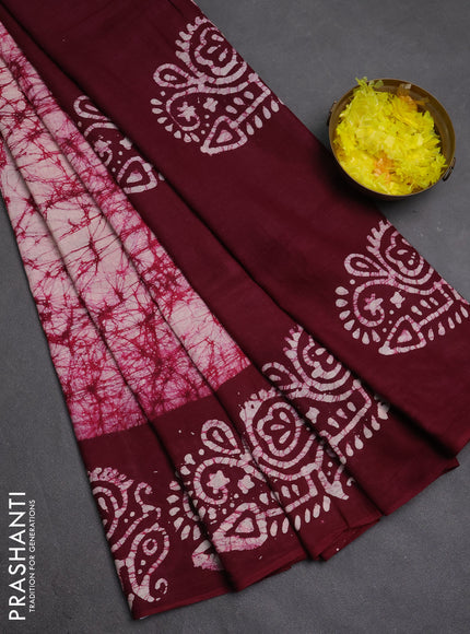 Batik cotton saree wine shade with allover prints and batik printed border