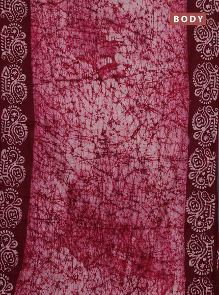 Batik cotton saree wine shade with allover prints and batik printed border