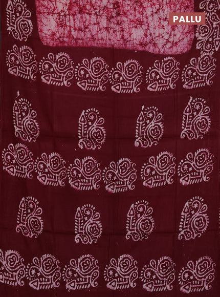Batik cotton saree wine shade with allover prints and batik printed border