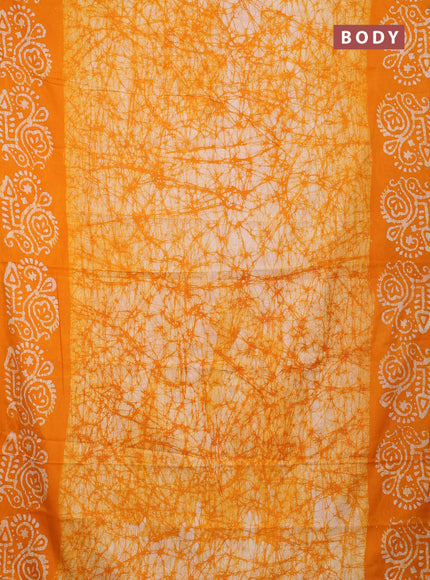 Batik cotton saree mango yellow with allover prints and batik printed border