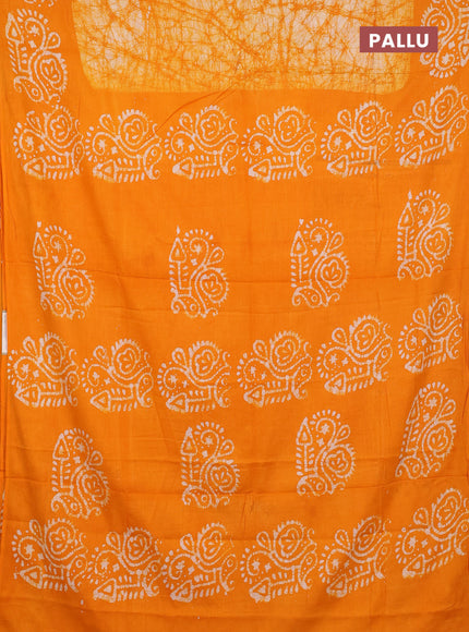 Batik cotton saree mango yellow with allover prints and batik printed border