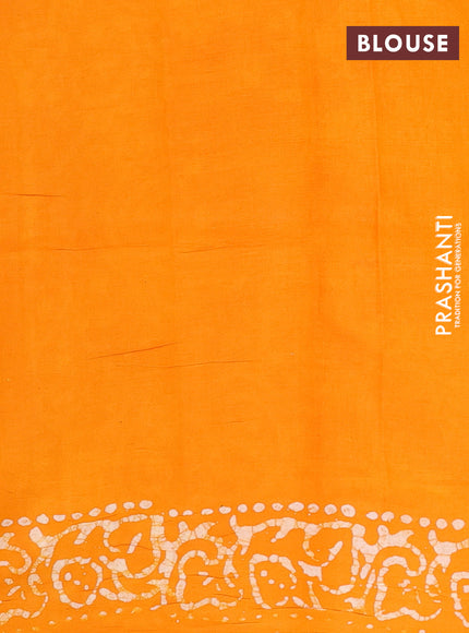Batik cotton saree mango yellow with allover prints and batik printed border