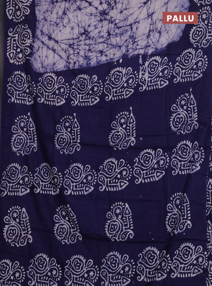 Batik cotton saree off white and navy blue with allover prints and batik printed border