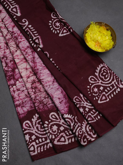 Batik cotton saree wine shade with allover prints and batik printed border