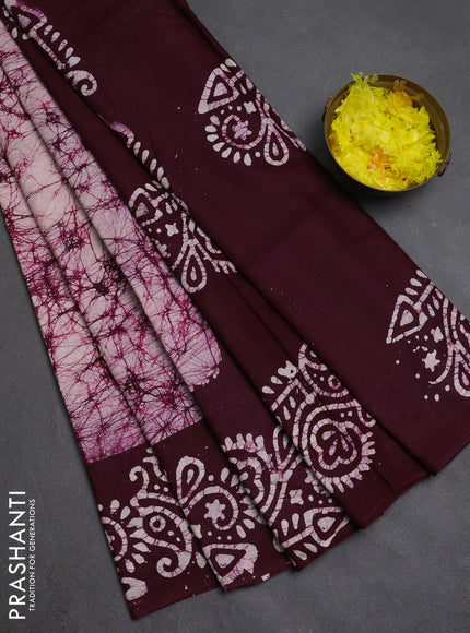 Batik cotton saree off white and wine shade with allover prints and batik printed border