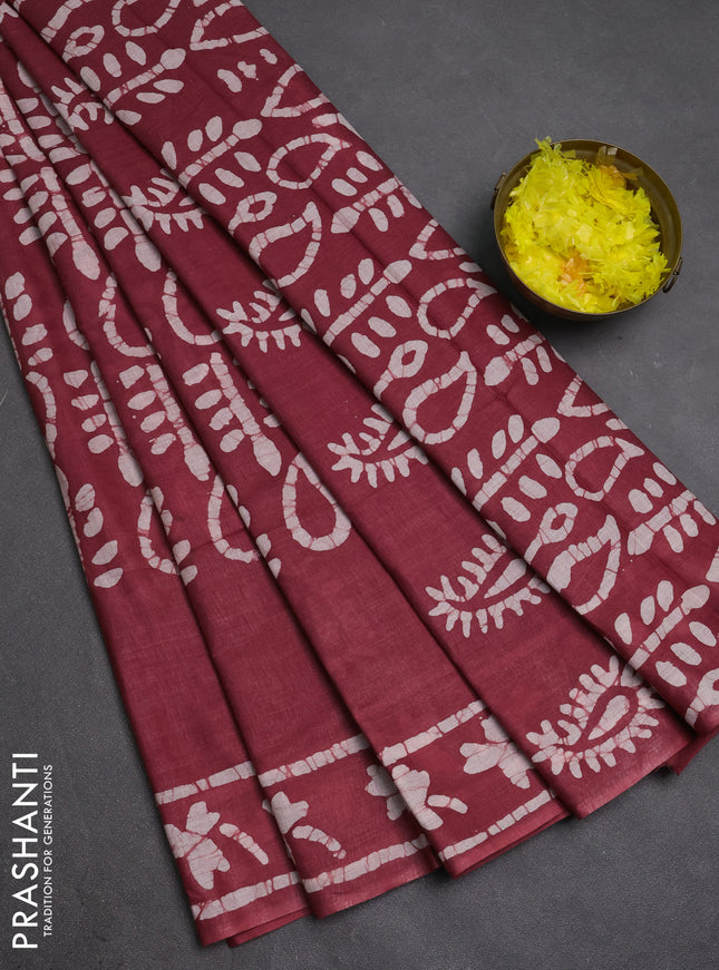 Batik cotton saree pastel maroon with allover prints and batik printed border