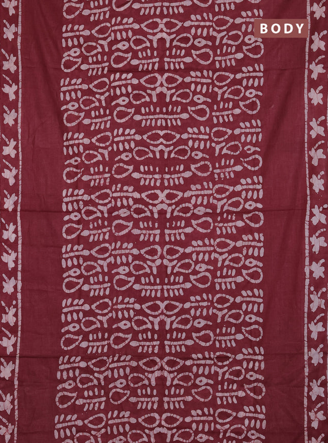 Batik cotton saree pastel maroon with allover prints and batik printed border