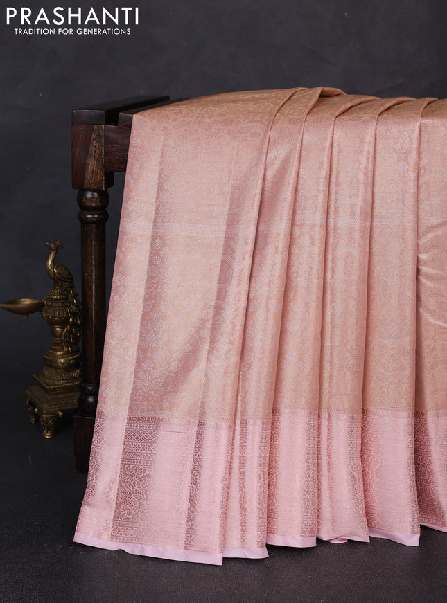 Bangalori tissue silk saree peach and mild pink with allover zari woven brocade weaves and long zari woven border