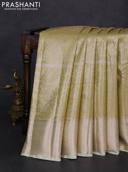 Bangalori tissue silk saree pista green with allover zari woven brocade weaves and zari woven border