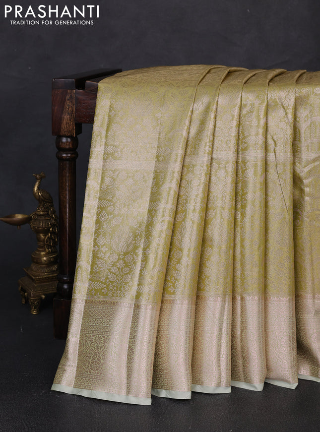 Bangalori tissue silk saree pista green with allover zari woven brocade weaves and zari woven border