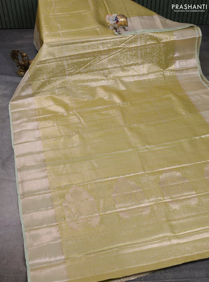 Bangalori tissue silk saree pista green with allover zari woven brocade weaves and zari woven border