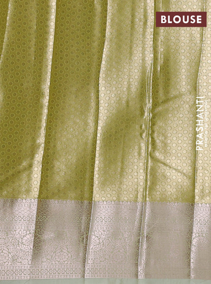 Bangalori tissue silk saree pista green with allover zari woven brocade weaves and zari woven border