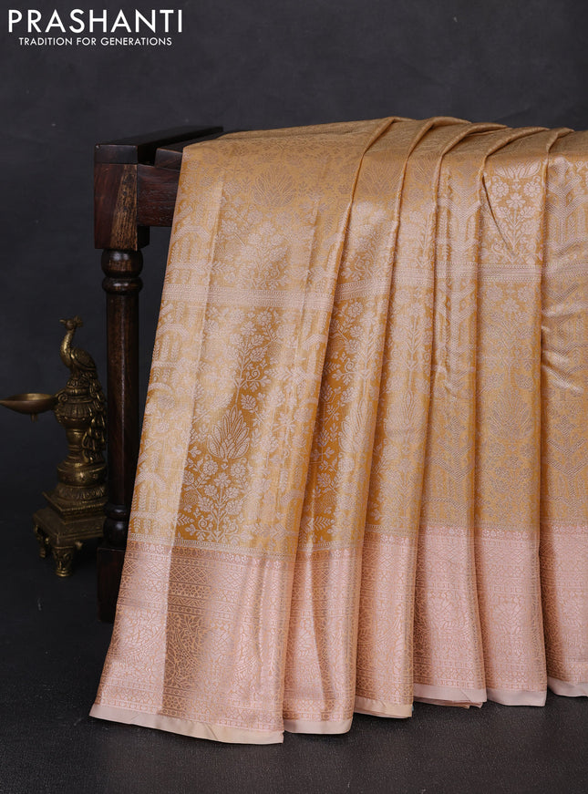 Bangalori tissue silk saree mustard yellow and peach with allover zari woven brocade weaves and long zari woven border