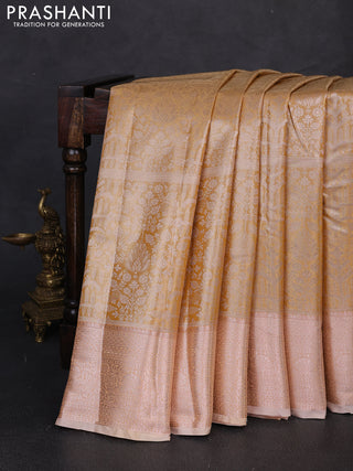 Bangalori tissue silk saree mustard yellow and peach with allover zari woven brocade weaves and long zari woven border
