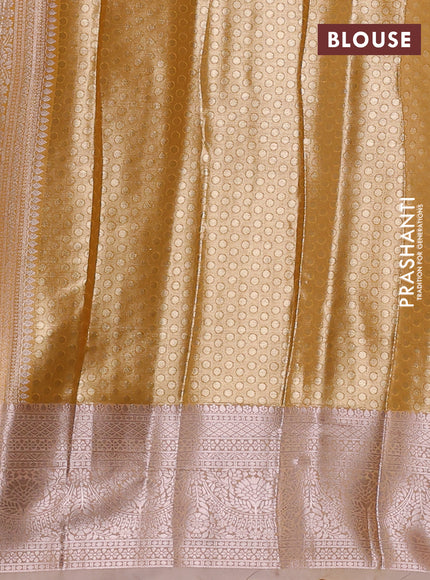 Bangalori tissue silk saree mustard yellow and peach with allover zari woven brocade weaves and long zari woven border