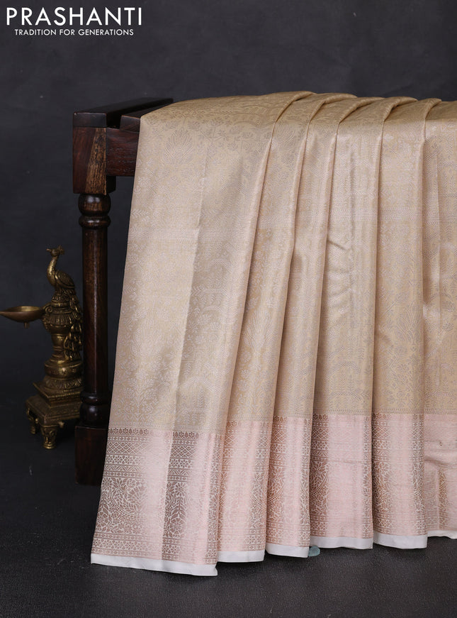 Bangalori tissue silk saree cream with allover zari woven brocade weaves and long zari woven border