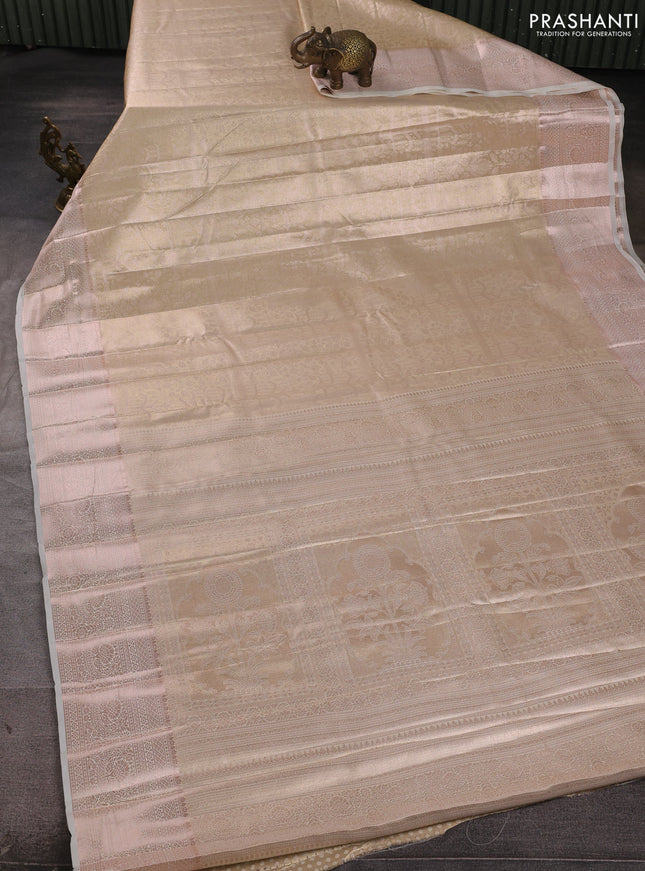 Bangalori tissue silk saree cream with allover zari woven brocade weaves and long zari woven border