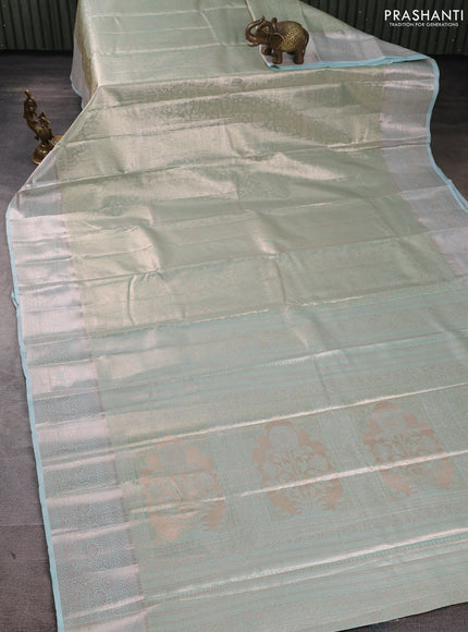 Bangalori tissue silk saree teal green with allover zari woven brocade weaves and zari woven border