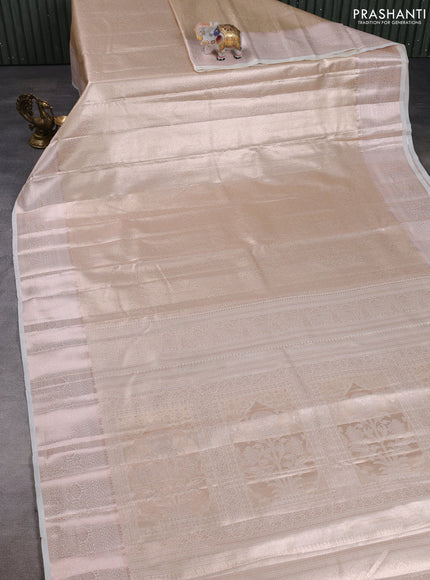 Bangalori tissue silk saree cream with allover zari woven brocade weaves and long zari woven border