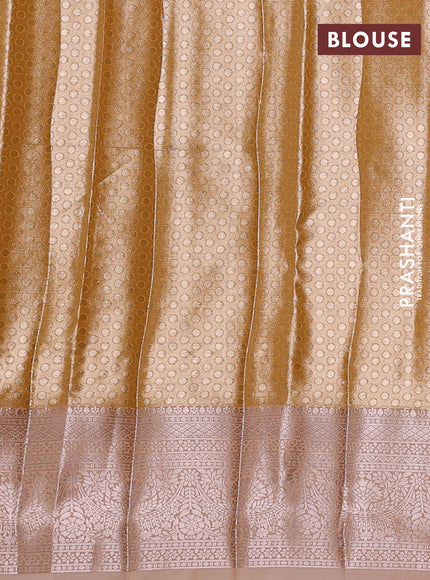 Bangalori tissue silk saree mustard and peach with allover zari woven brocade weaves and long zari woven border