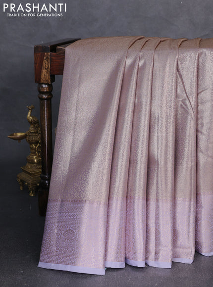 Bangalori tissue silk saree pastel lavender with allover zari woven brocade weaves and long zari woven border
