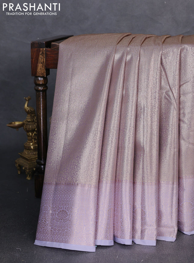 Bangalori tissue silk saree pastel lavender with allover zari woven brocade weaves and long zari woven border