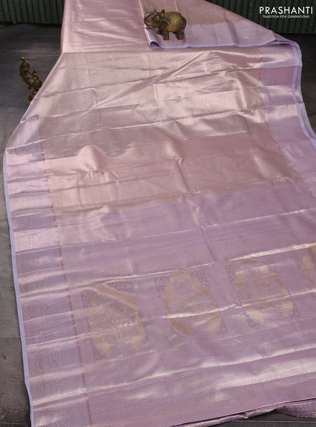 Bangalori tissue silk saree pastel lavender with allover zari woven brocade weaves and long zari woven border