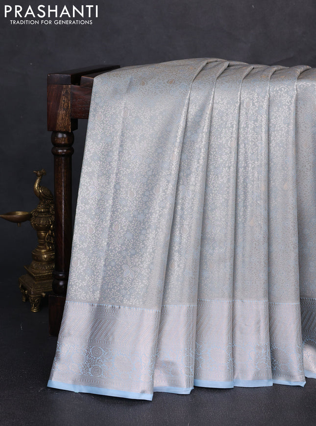 Bangalori tissue silk saree pastel blue with allover zari woven brocade weaves and zari woven border